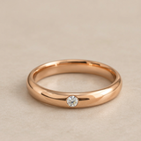 Alianza de boda con 1 diamante en oro 18k