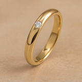 Alianza de boda con 1 diamante en oro 18k