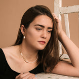 Pendientes Cowrie pearls