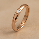 Alianza de boda con 1 diamante en oro 18k