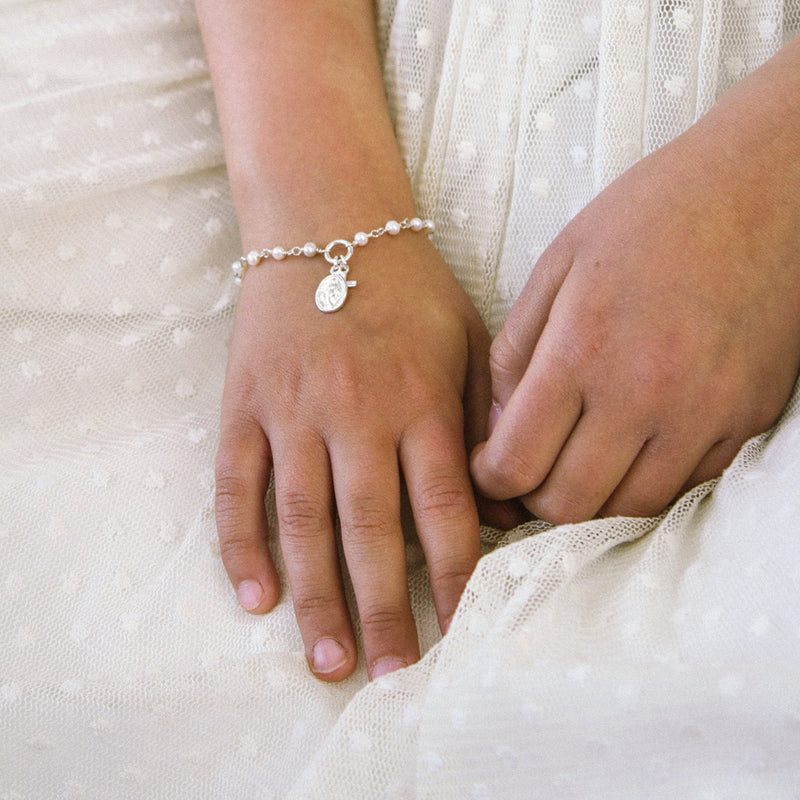 Pulsera rosario virgen milagrosa y cruz de plata ó vermeil y perlas cultivadas en agua dulce.